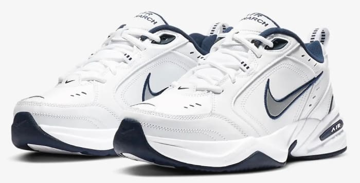 View of white and navy Nike shoes.
